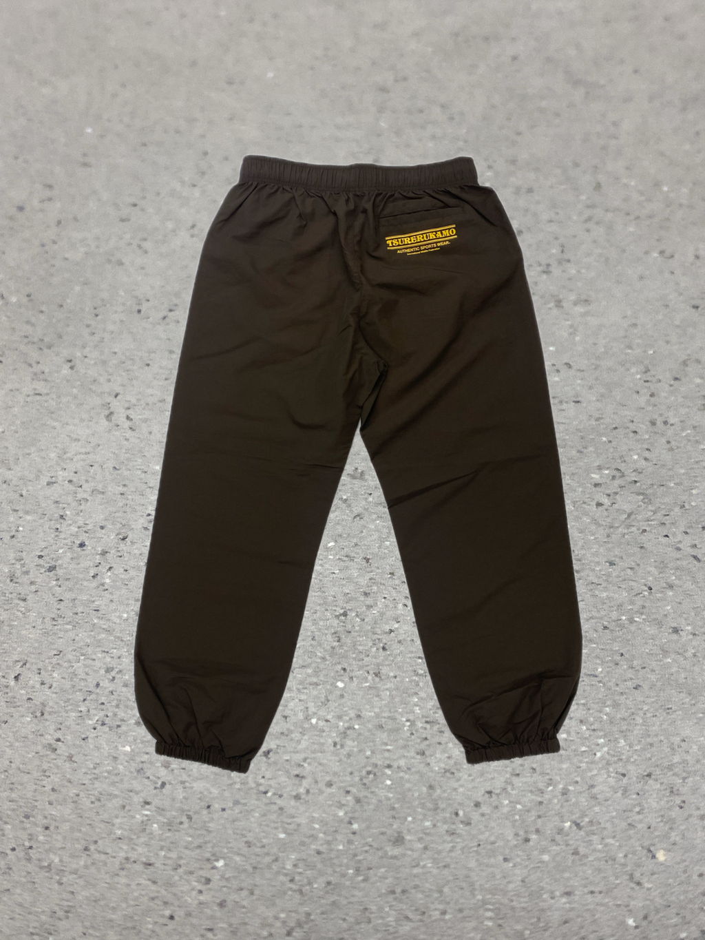 2026S/S 髭髭倶楽部 釣れるカモ トレーニングパンツ ブラウン