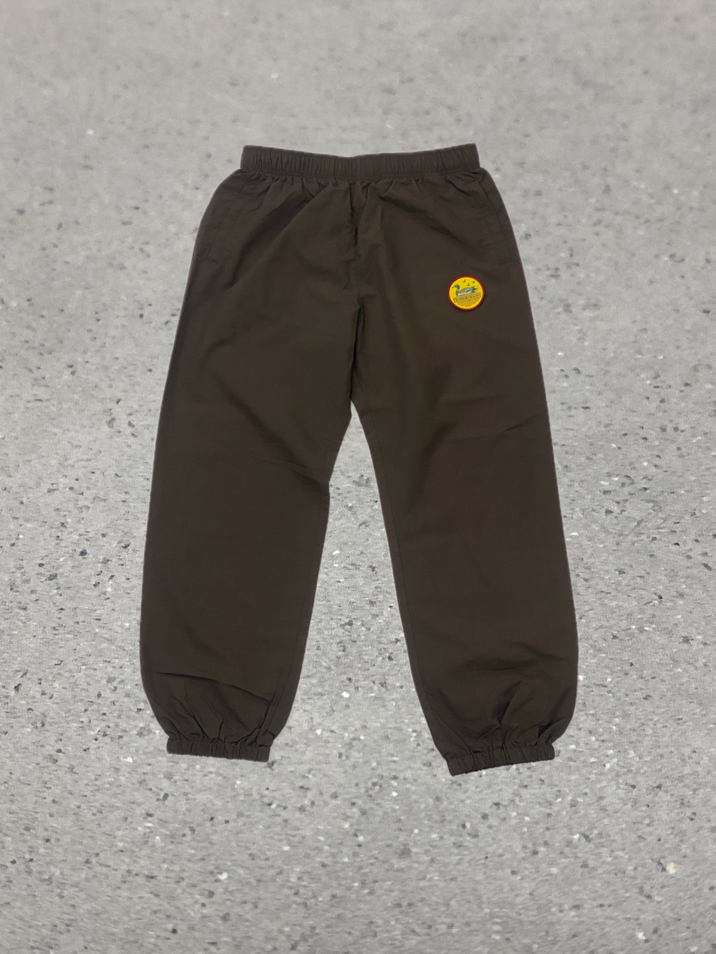 2026S/S 髭髭倶楽部 釣れるカモ トレーニングパンツ ブラウン