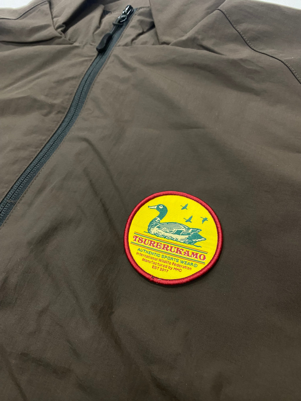 2026S/S 髭髭倶楽部 釣れるカモ トレーニングジャケット ブラウン
